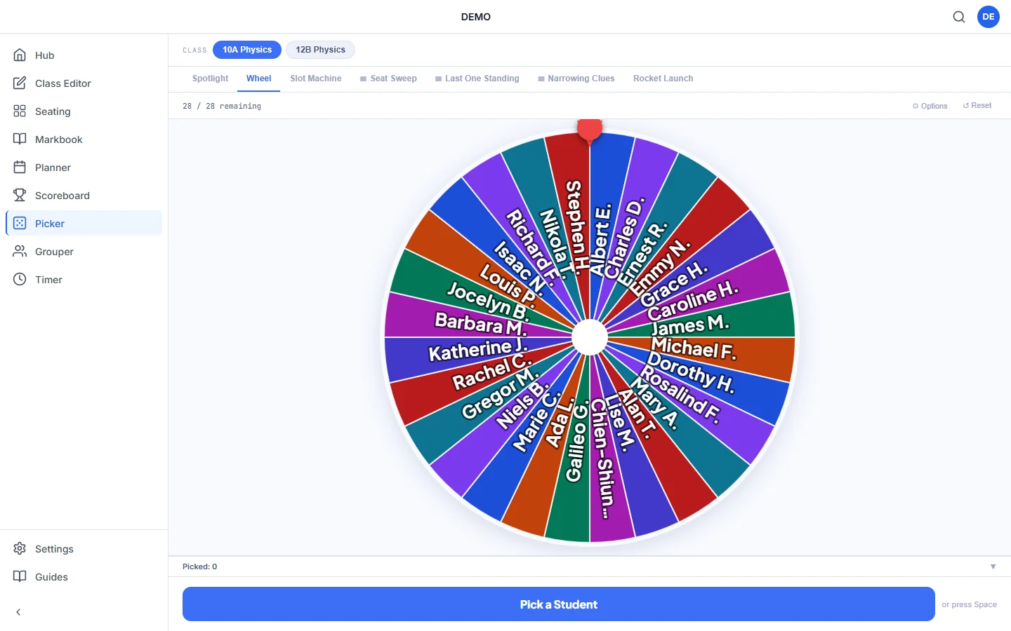 Kredits random name picker showing a colourful wheel of 28 pupil names from a demo class of famous scientists